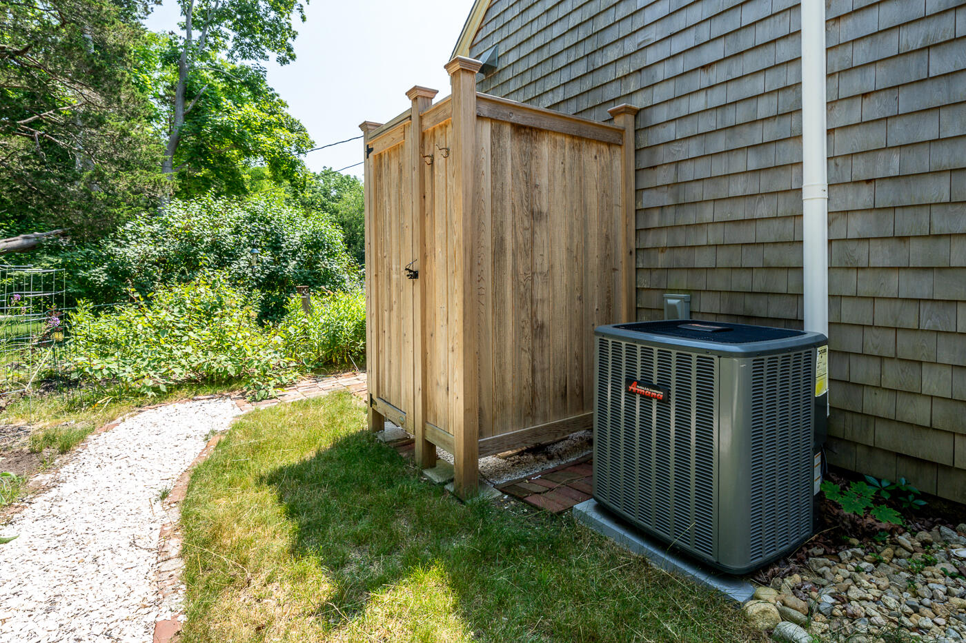 276 County Road Bourne, MA 02532 - Photo 54 of 64 a view of a backyard with plants