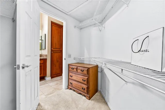 a bathroom with a sink a toilet a tub and shower