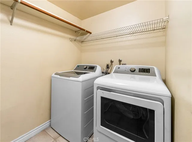 a bathroom with a sink and mirror with toilet