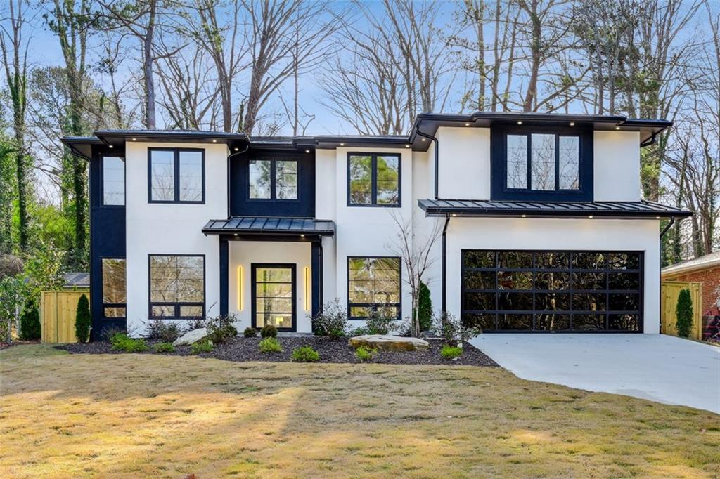 a house view with a garden space