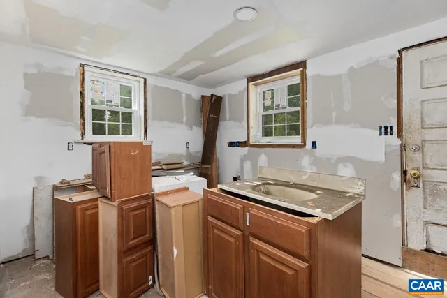 an empty room with windows