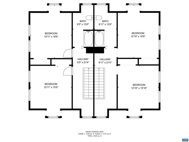a view of a yard in front of a house with plants and large tree