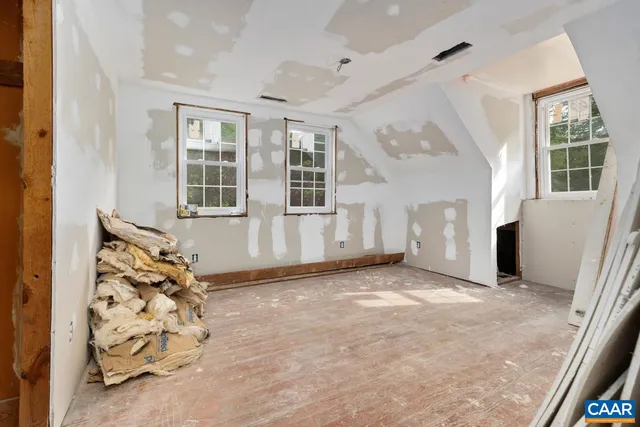 a view of a lake with a tree