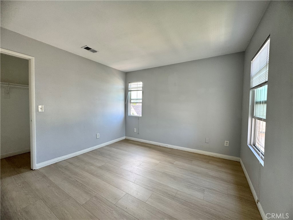 2840 Maxson Road El Monte, CA 91732 - Photo 12 of 20 a view of an empty room with wooden floor and a window