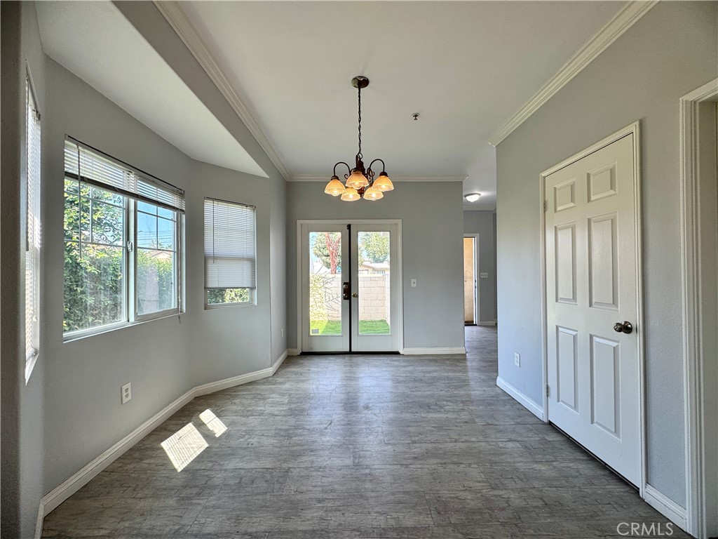 2840 Maxson Road El Monte, CA 91732 - Photo 3 of 20 a view of an empty room with window and wooden floor