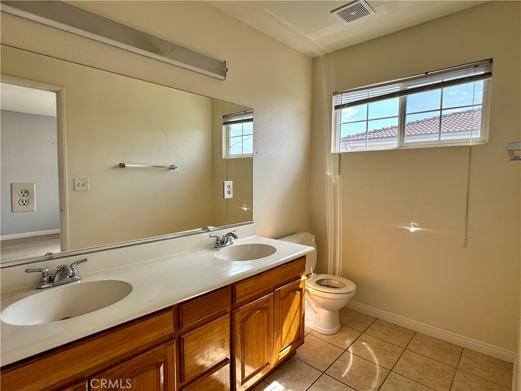 2840 Maxson Road El Monte, CA 91732 - Photo 10 of 20 a bathroom with a granite countertop sink and a mirror