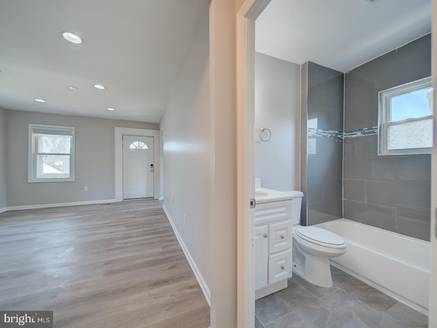 4217 Vine Street Capitol Heights, MD 20743 - Photo 23 of 60 a bathroom with a toilet a sink and a bathtub