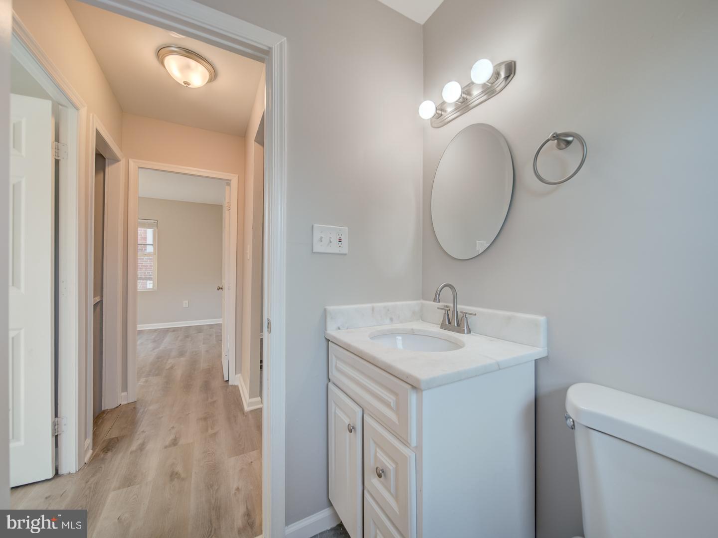 4217 Vine Street Capitol Heights, MD 20743 - Photo 26 of 60 a bathroom with a sink vanity and a mirror