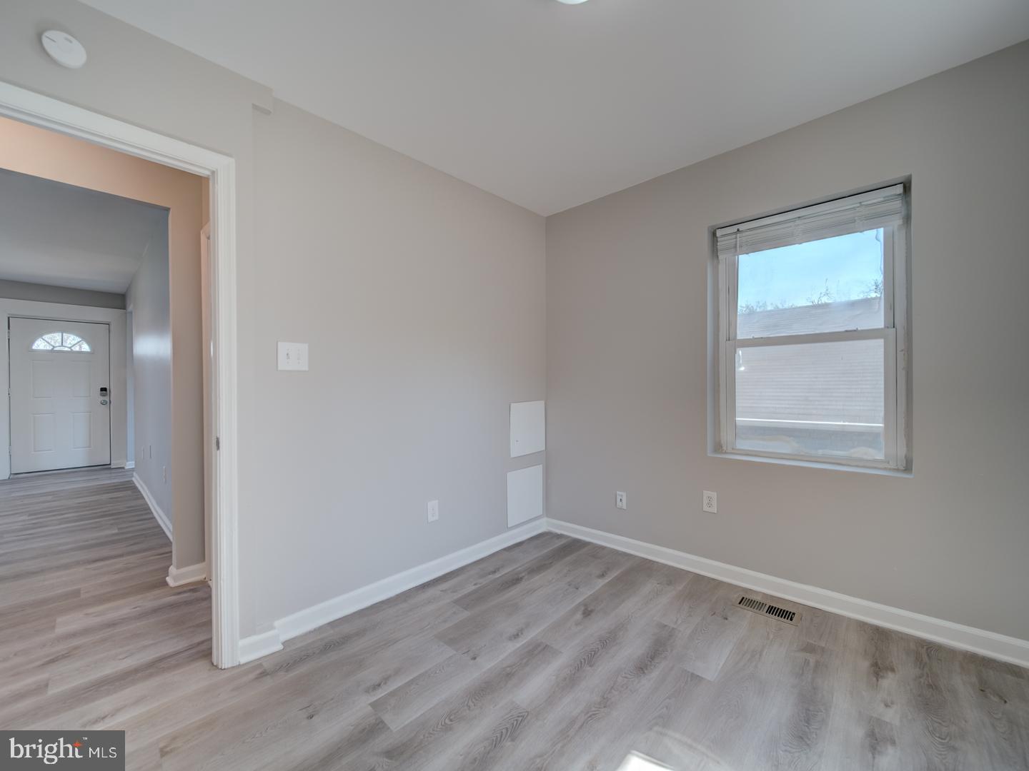 4217 Vine Street Capitol Heights, MD 20743 - Photo 31 of 60 a view of a room with wooden floor and windows