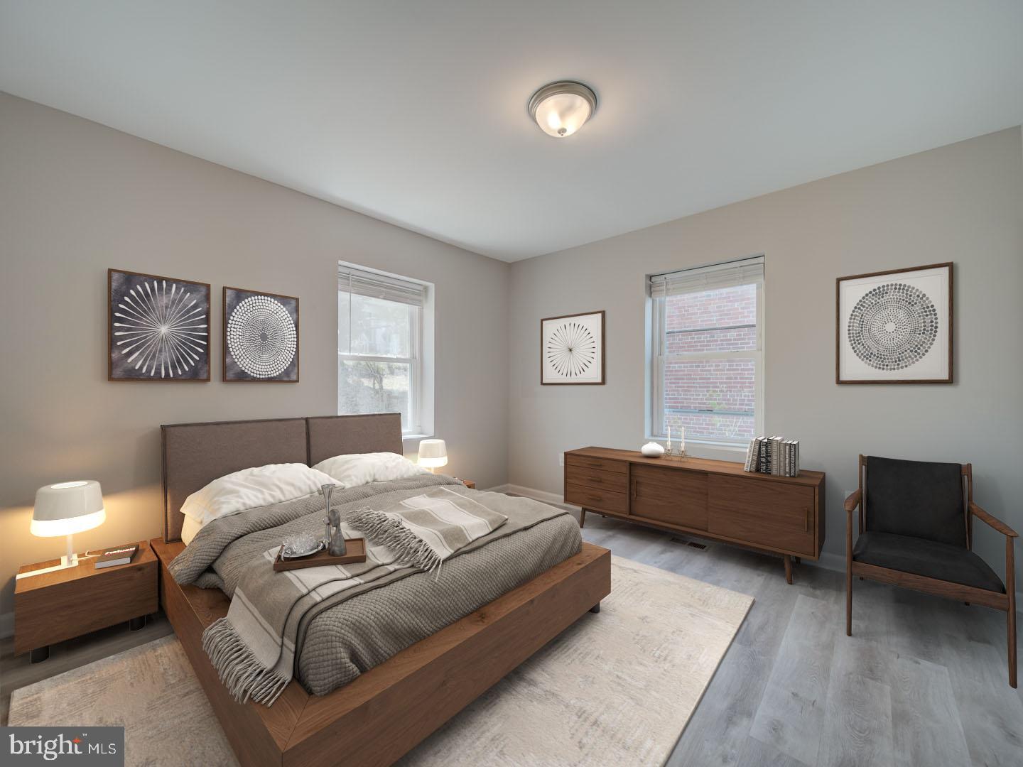 4217 Vine Street Capitol Heights, MD 20743 - Photo 35 of 60 a bedroom with a bed couch and a window