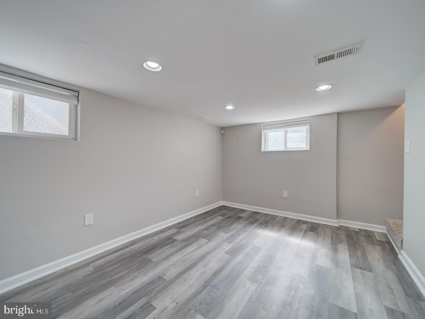 4217 Vine Street Capitol Heights, MD 20743 - Photo 39 of 60 a view of room with window and wooden floor