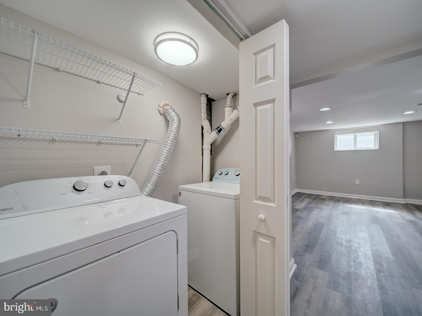 4217 Vine Street Capitol Heights, MD 20743 - Photo 41 of 60 a view of storage and utility room with washer and dryer