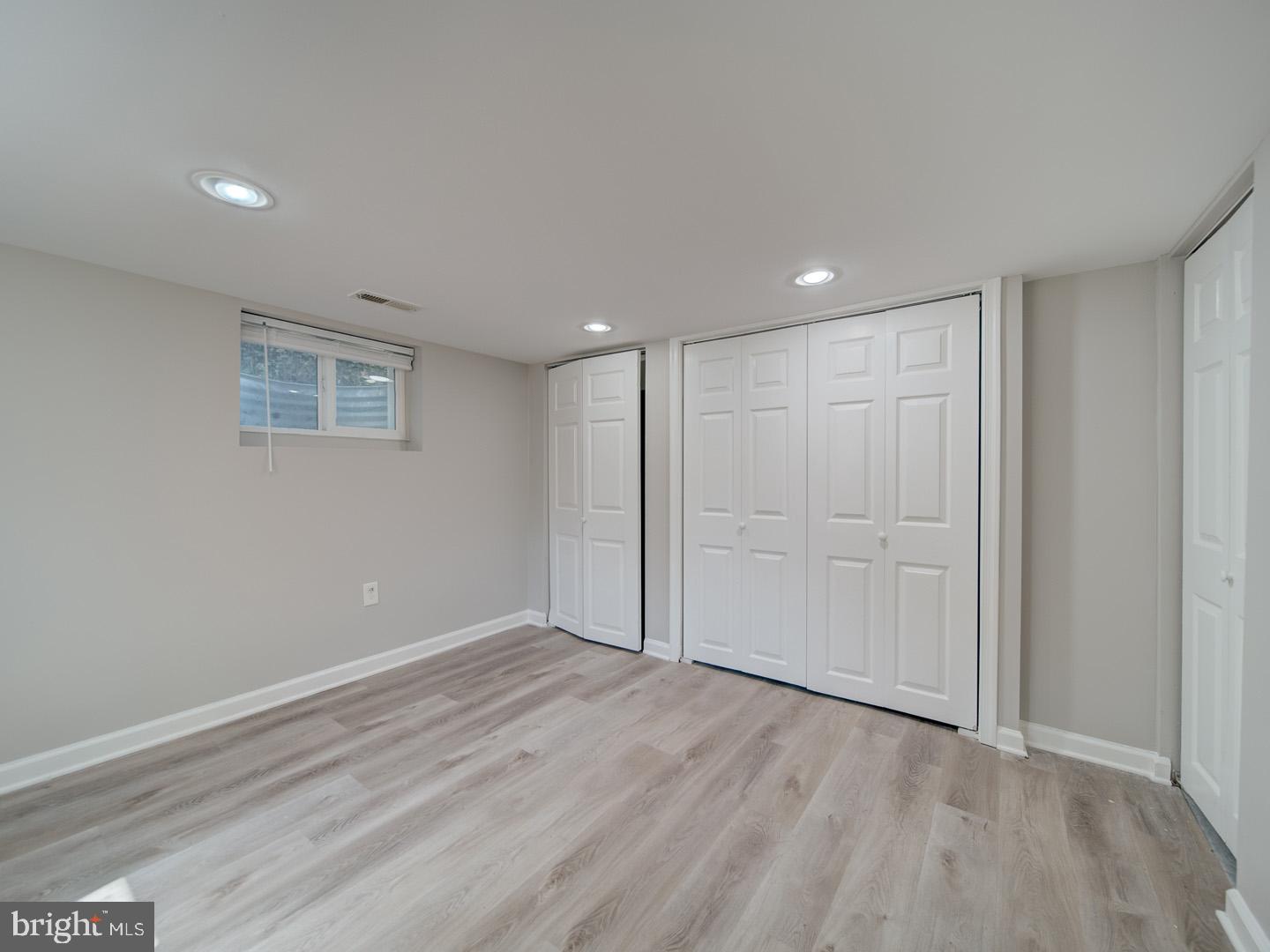 4217 Vine Street Capitol Heights, MD 20743 - Photo 51 of 60 a view of an empty room with wooden floor
