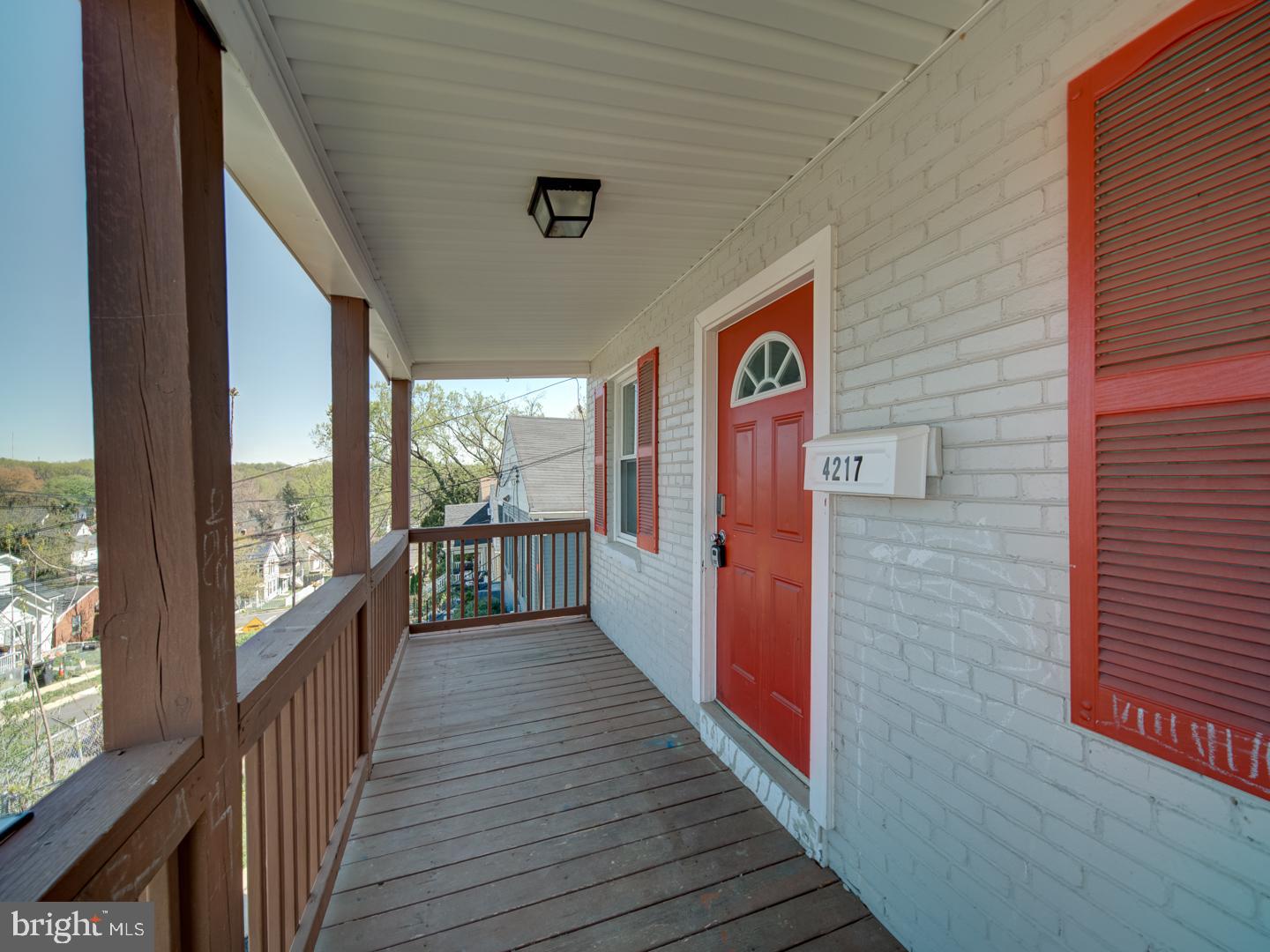 4217 Vine Street Capitol Heights, MD 20743 - Photo 52 of 60 a view of a balcony with wooden floor