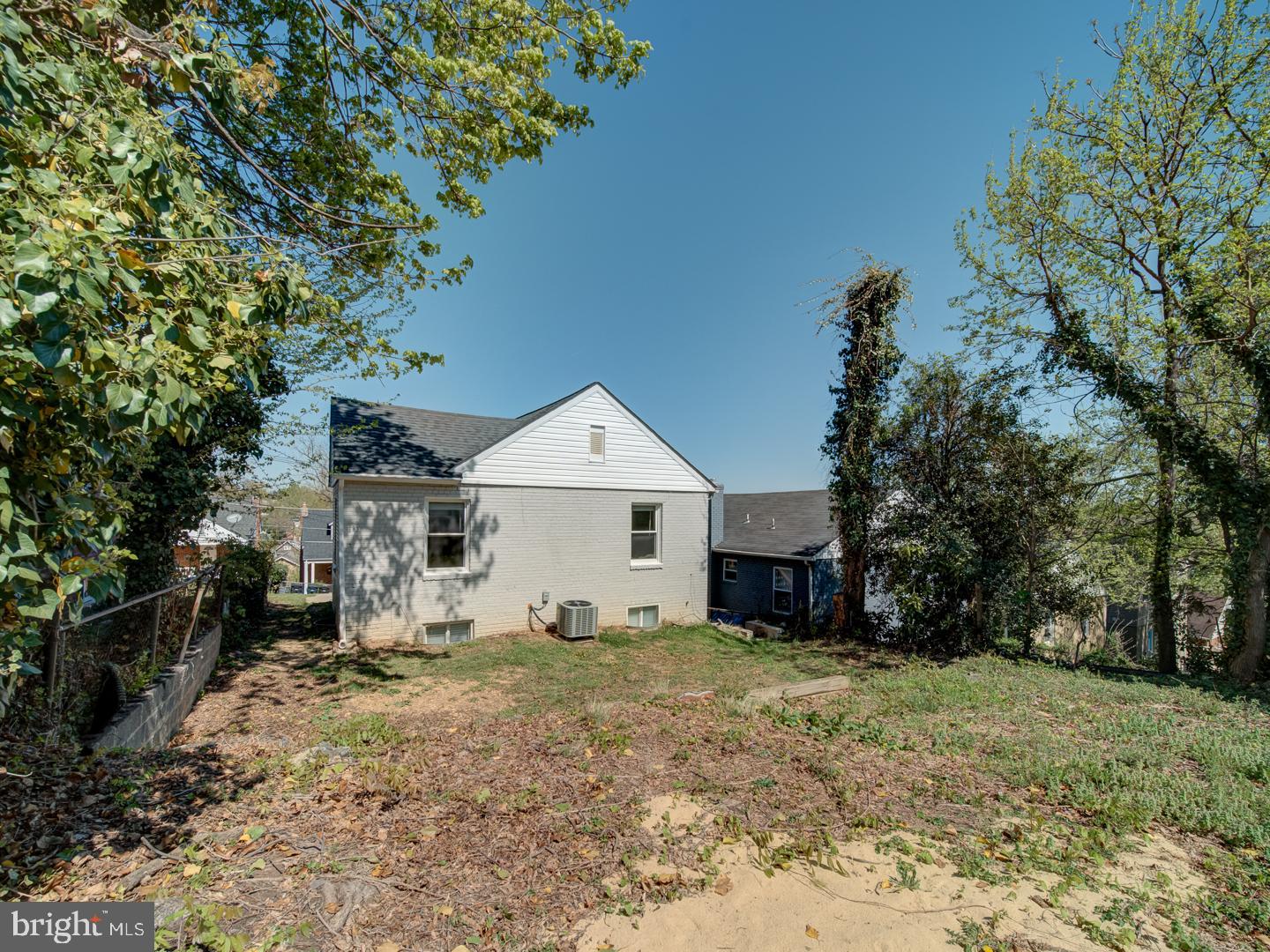 4217 Vine Street Capitol Heights, MD 20743 - Photo 54 of 60 a view of a house with a yard