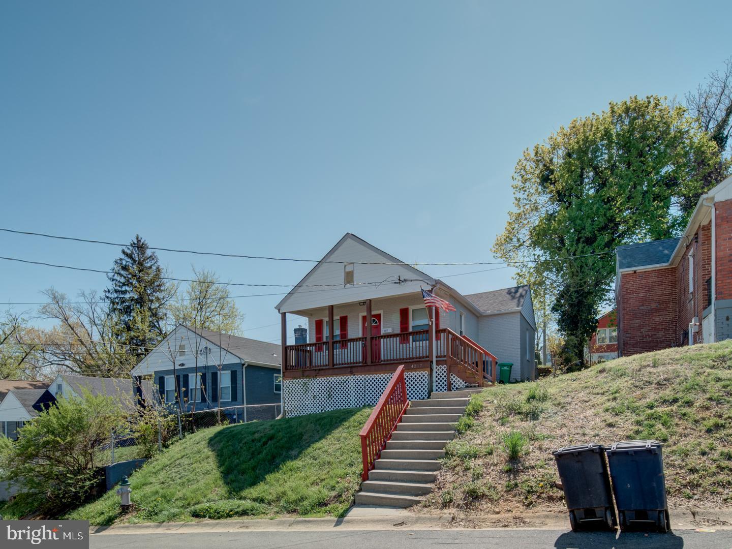 4217 Vine Street Capitol Heights, MD 20743 - Photo 7 of 60 a front view of a house with a yard
