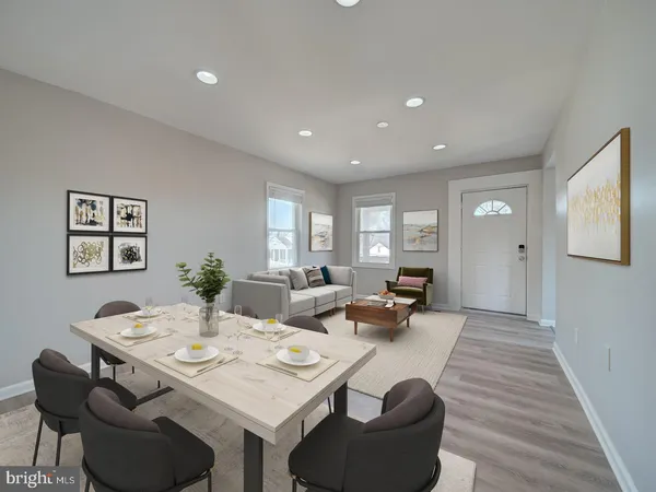 a kitchen with granite countertop white cabinets white stainless steel appliances and a sink