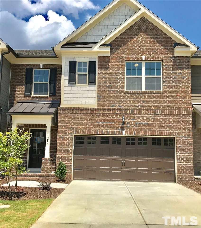 1907 Blue Jay Point Apex, NC 27502 - Photo 1 of 29 a front view of a house with yard