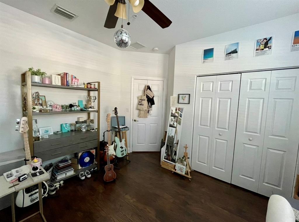 817 Southwest 147th Avenue, Unit 817 Pembroke Pines, FL 33027 - Photo 33 of 34 a view of a room with gym equipment