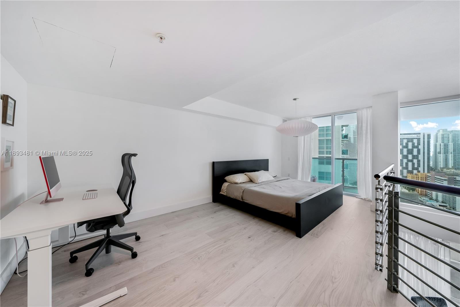 41 Southeast 5th Street, Unit 1709 Miami, FL 33131 - Photo 17 of 33 a living room with furniture and a table