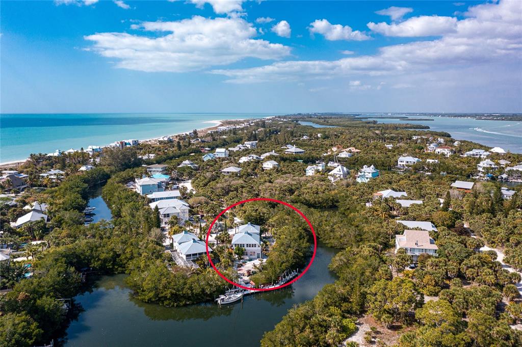 a view of a city with an ocean