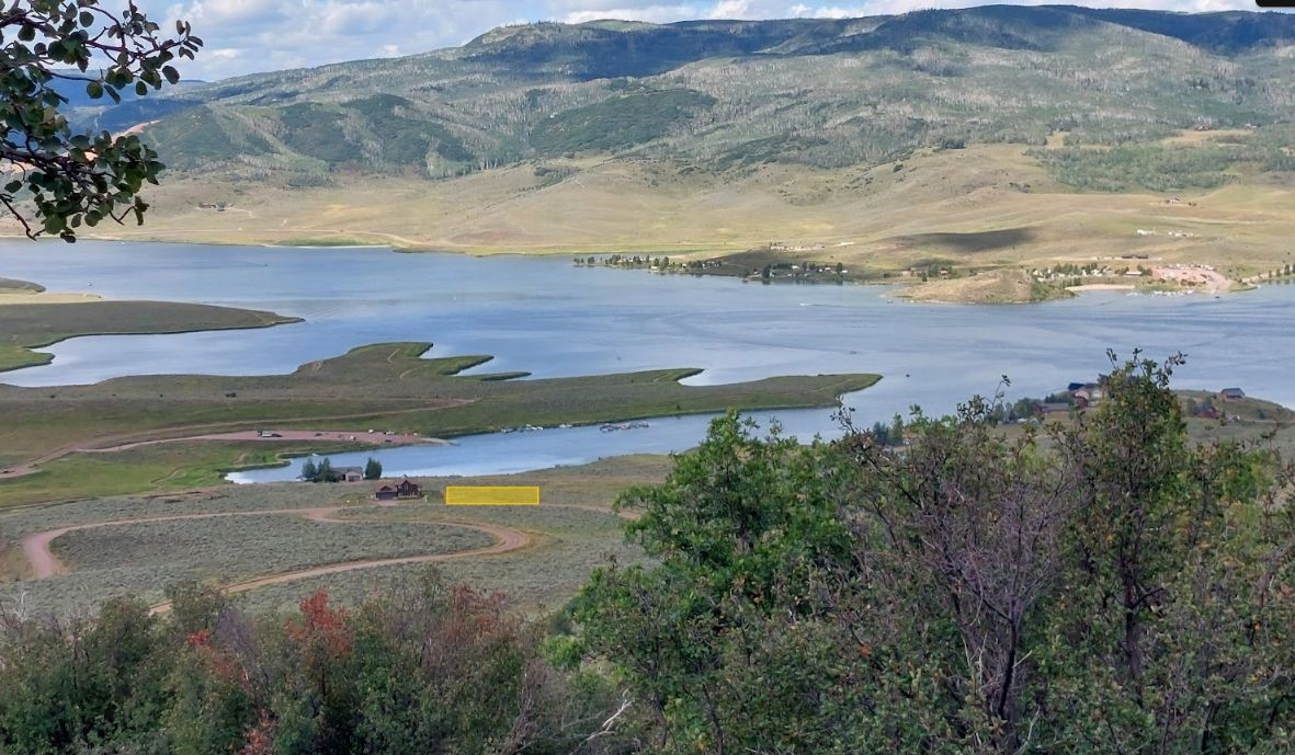 24395 Arapahoe Road Oak Creek, CO 80467 - Photo 8 of 9 a view of lake with mountain