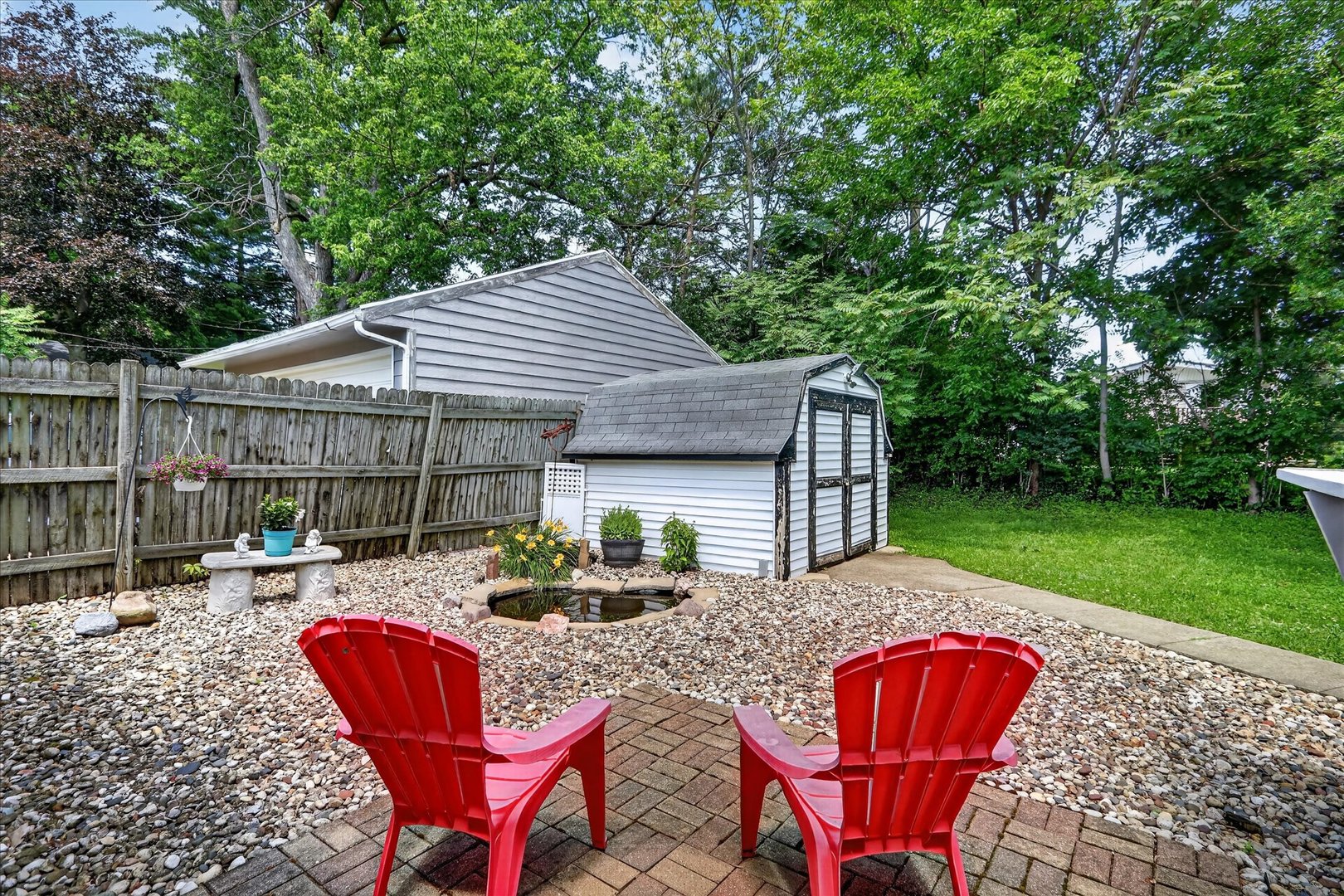 1204 West Violet Street Freeport, IL 61032 - Photo 35 of 36 a view of house with backyard and outdoor seating