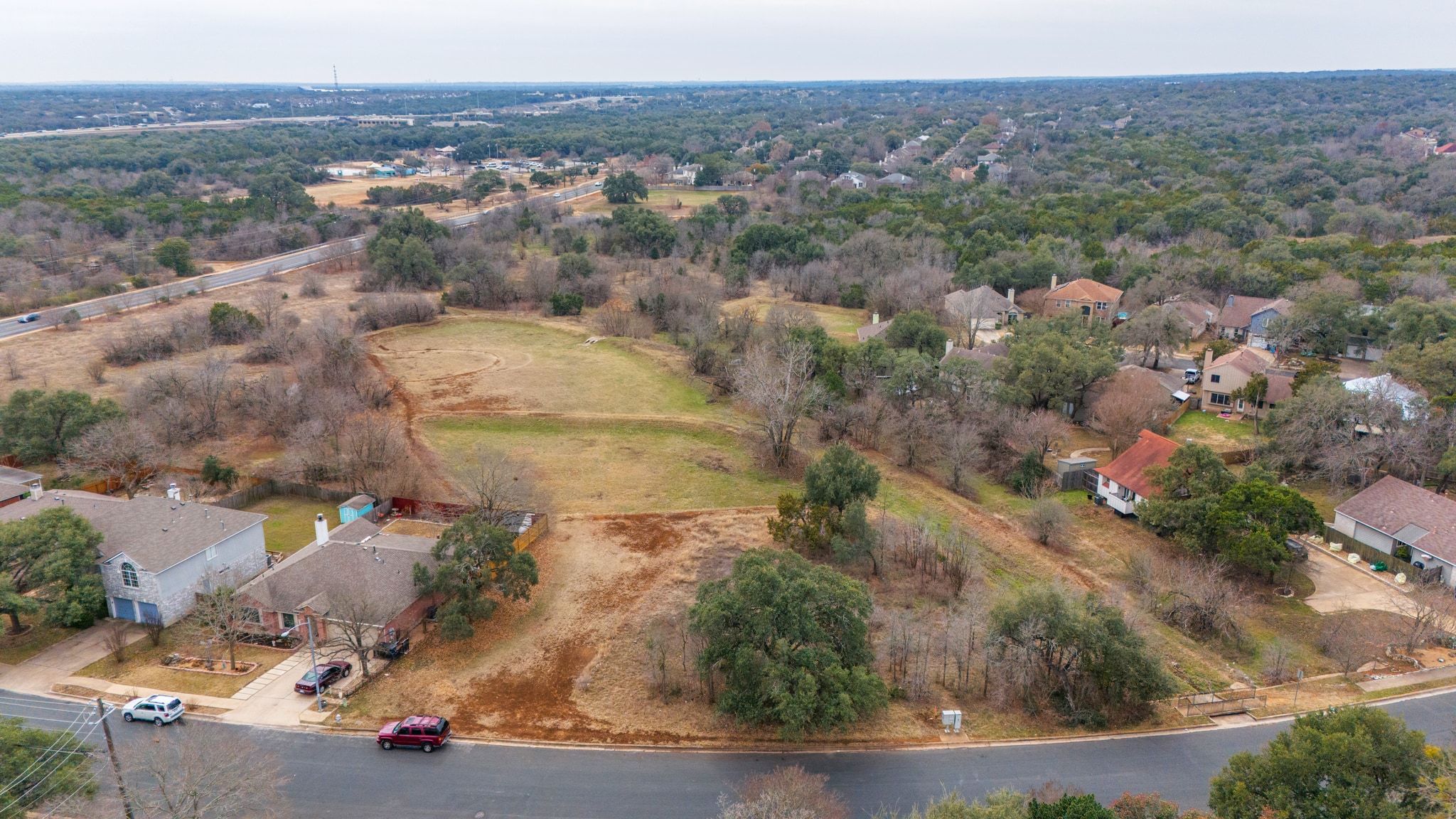 5609 Kayview Drive Austin, TX 78749 - Photo 5 of 9 an aerial view of residential houses with outdoor space
