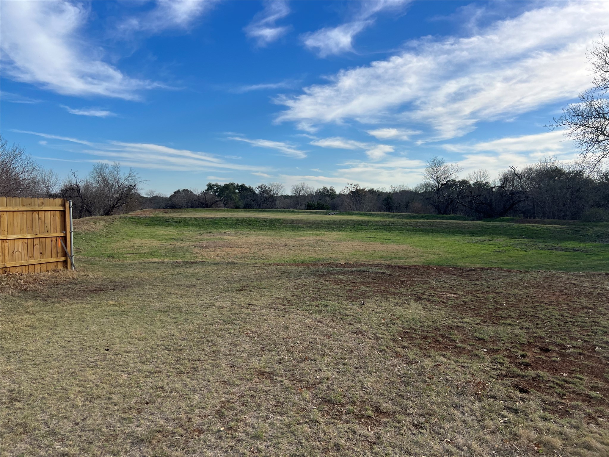 5609 Kayview Drive Austin, TX 78749 - Photo 7 of 9 a view of a field with an trees