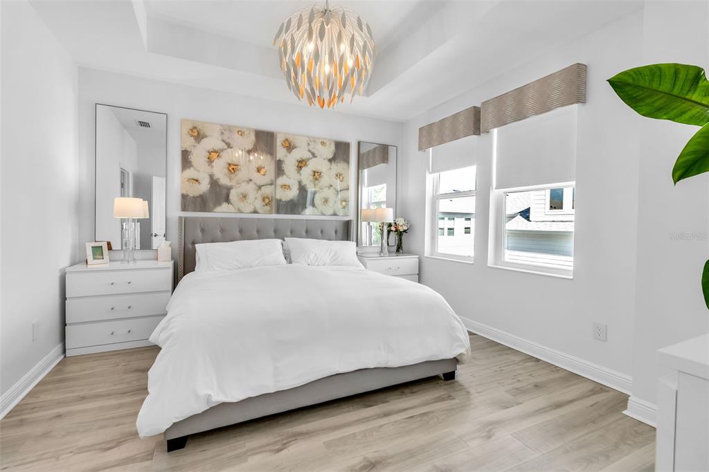2554 Ruffing Court Sarasota, FL 34237 - Photo 22 of 32 a large white bed in a white room