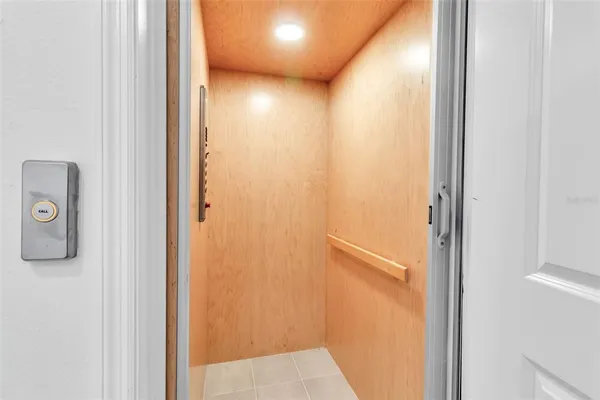 a view of a bathroom from a hallway