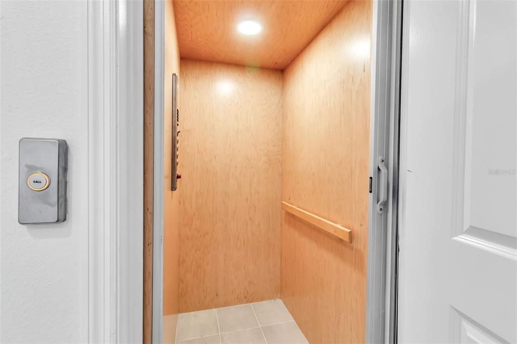 2554 Ruffing Court Sarasota, FL 34237 - Photo 8 of 32 a view of a bathroom from a hallway