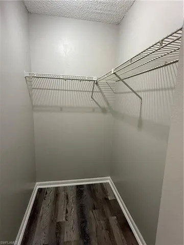 a view of a room with racks on the wall