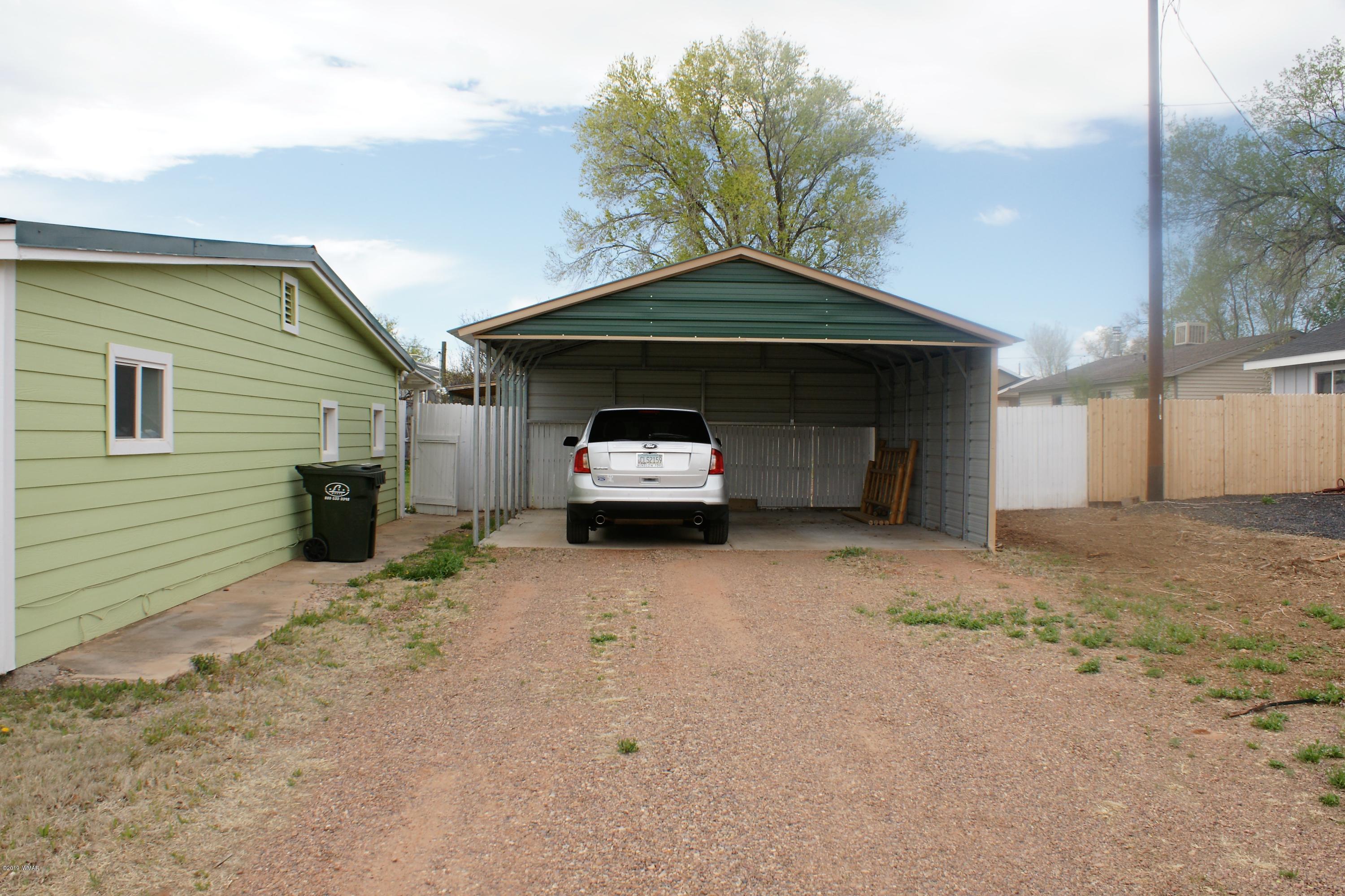 321 South 5th W Street Snowflake, AZ 85937 - Photo 11 of 32 a car parked in front of house