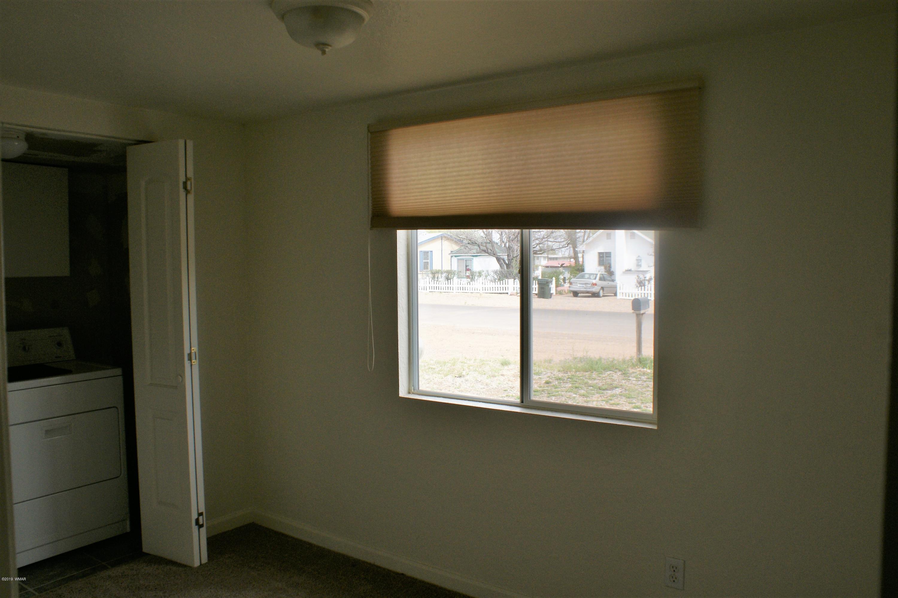 321 South 5th W Street Snowflake, AZ 85937 - Photo 23 of 32 a view of a hallway with a window