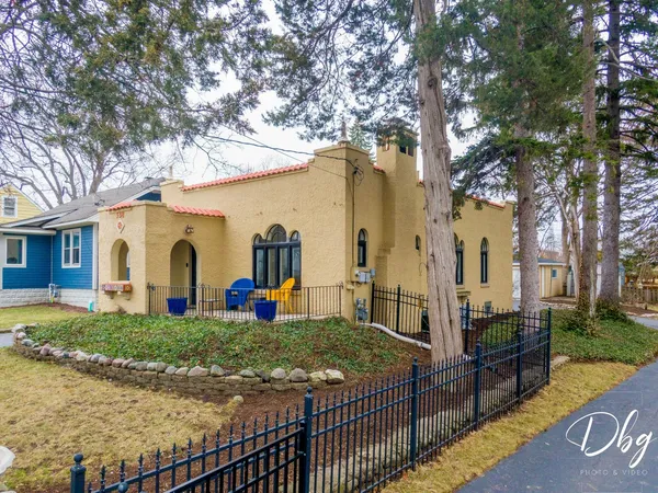 a hallway with view of a bathroom