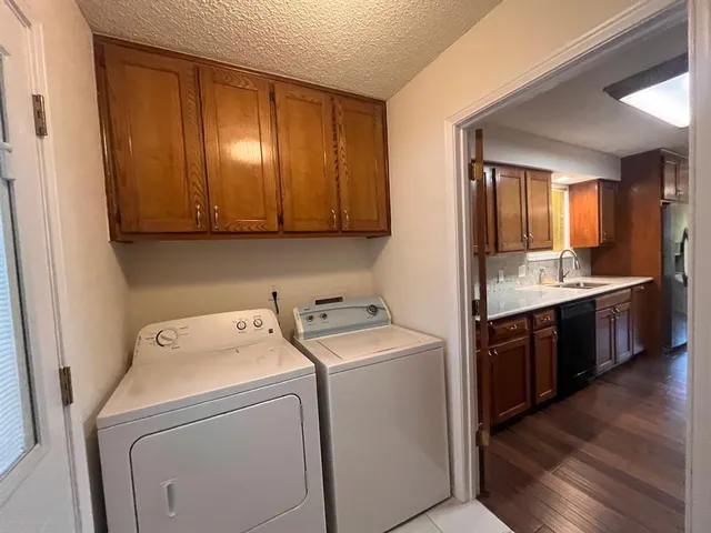 a view of utility room and washer and dryer
