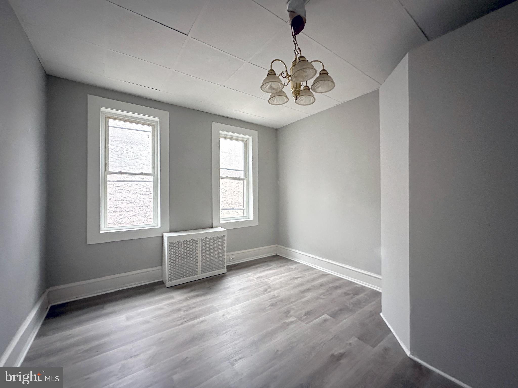 5424 Walnut Street Philadelphia, PA 19139 - Photo 6 of 7 a view of an empty room with a window