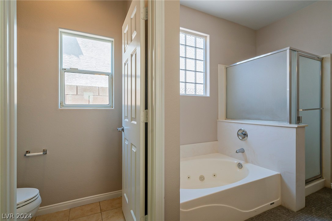 7858 Midnight Ride Street Las Vegas, NV 89131 - Photo 12 of 24 Separate tub and shower combo.
