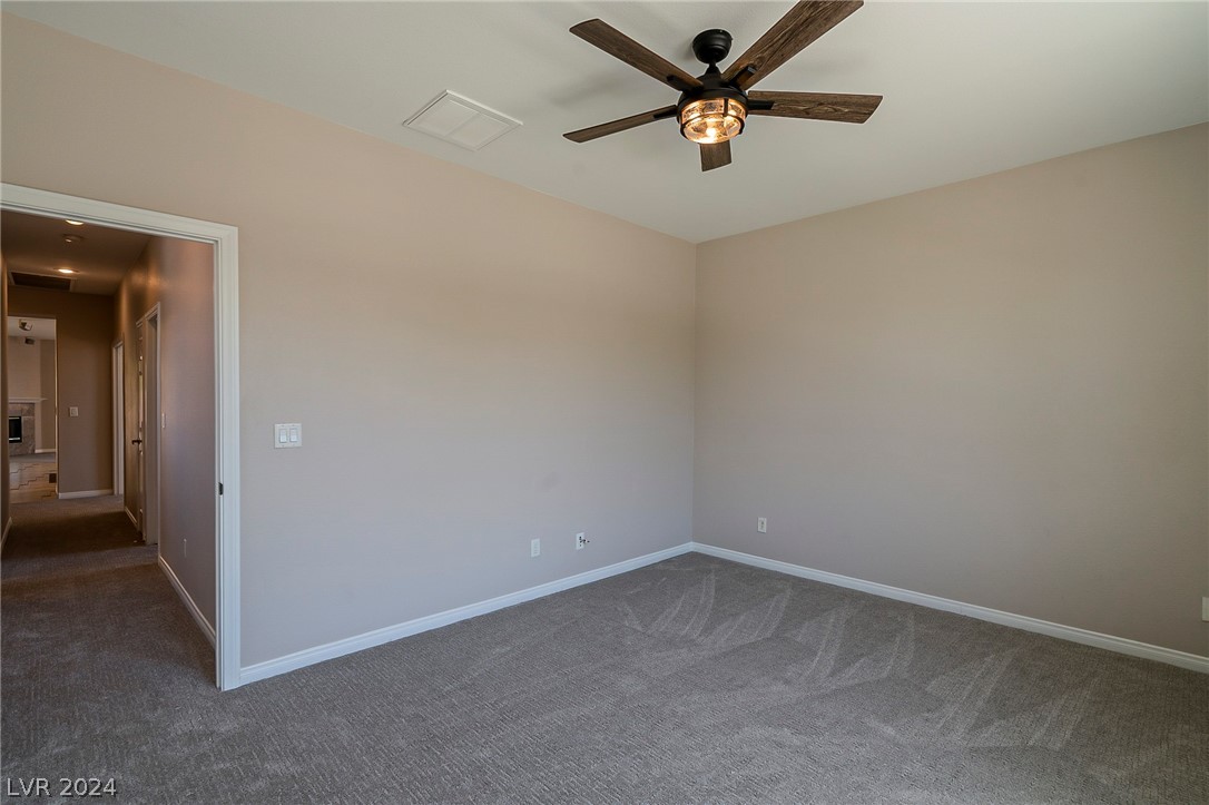 7858 Midnight Ride Street Las Vegas, NV 89131 - Photo 15 of 24 1st Bedroom down the hall closest to the front of