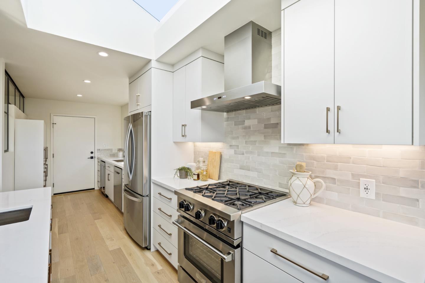 1914 Bishop Road Belmont, CA 94002 - Photo 15 of 79 a kitchen with a stove and a refrigerator