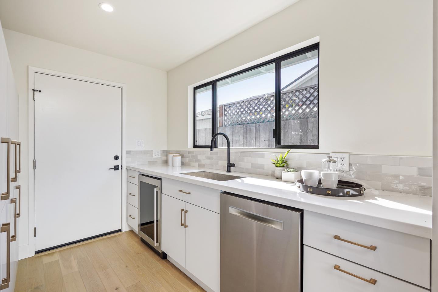 1914 Bishop Road Belmont, CA 94002 - Photo 16 of 79 a kitchen with a sink cabinets and window