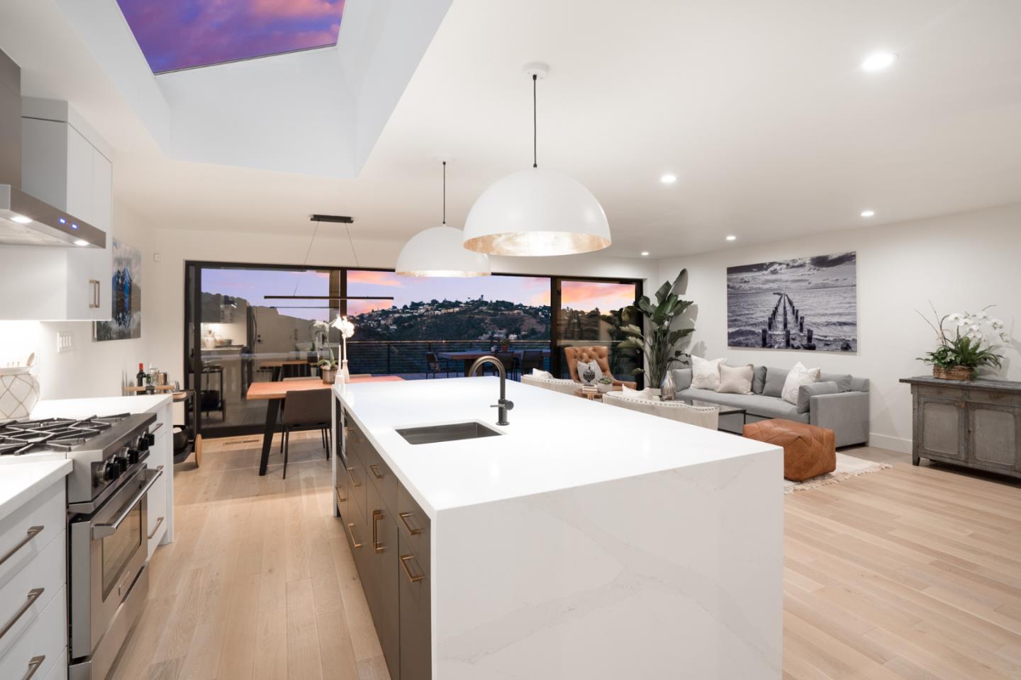 1914 Bishop Road Belmont, CA 94002 - Photo 20 of 79 a kitchen with stainless steel appliances granite countertop a stove and a view of living room