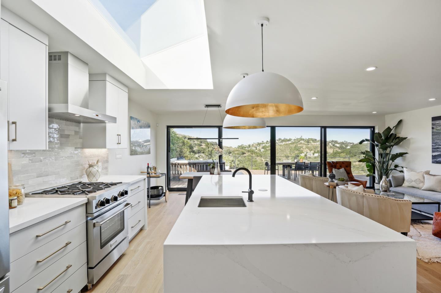 1914 Bishop Road Belmont, CA 94002 - Photo 22 of 79 a kitchen with stainless steel appliances granite countertop a sink a stove and a wooden floors