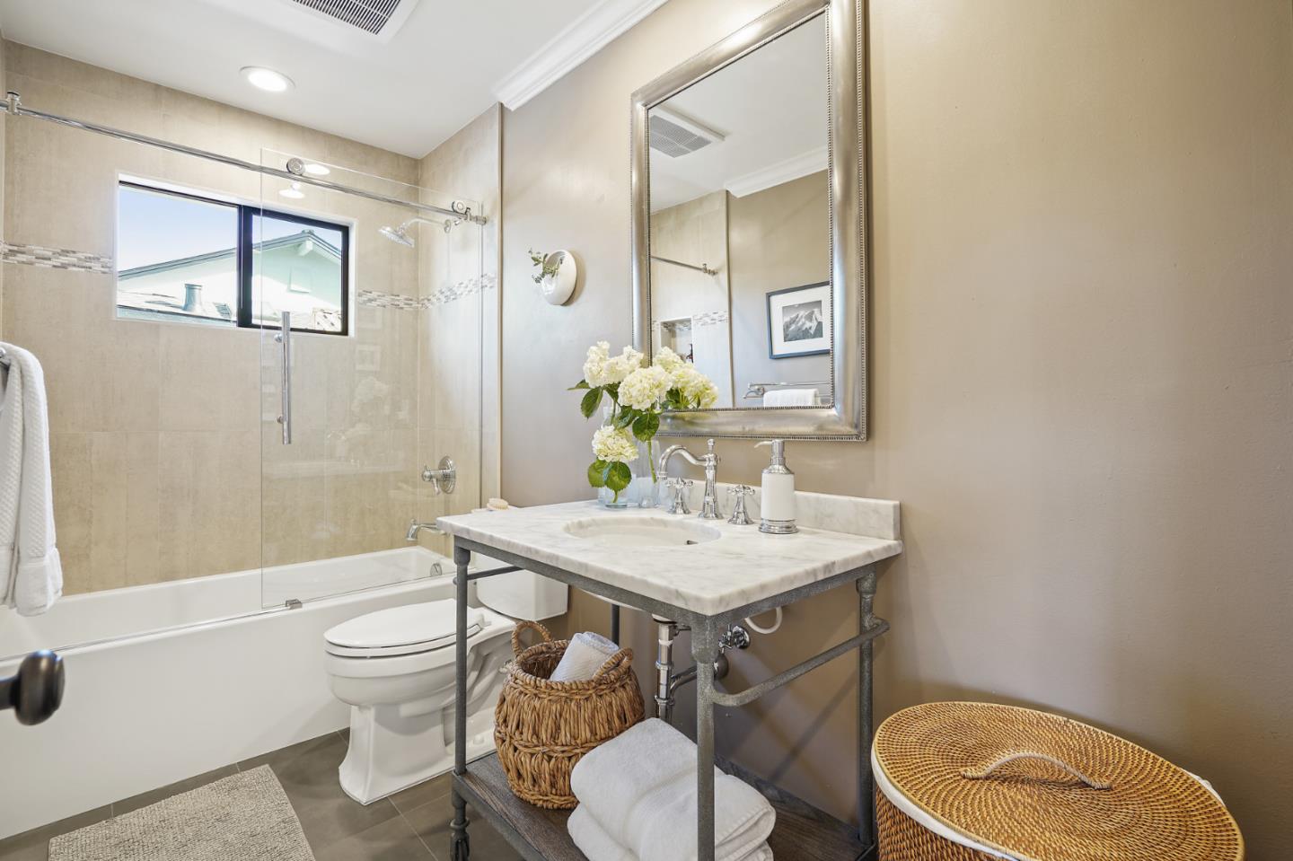 1914 Bishop Road Belmont, CA 94002 - Photo 41 of 79 a bathroom with a toilet a sink and a bathtub