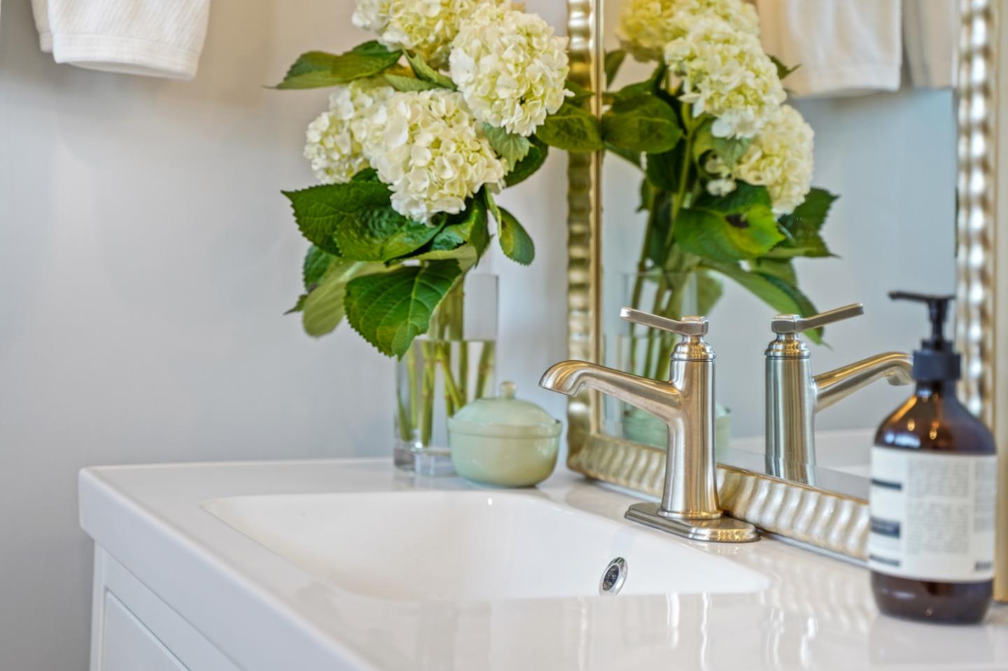 1914 Bishop Road Belmont, CA 94002 - Photo 42 of 79 a vase of flowers sitting on a table