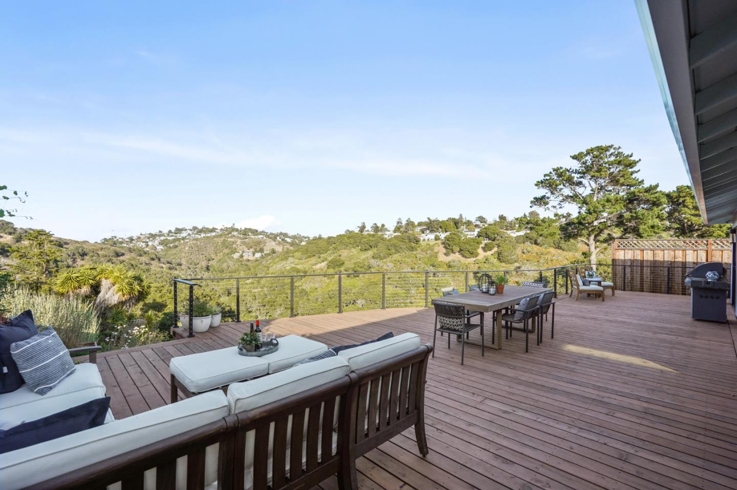 1914 Bishop Road Belmont, CA 94002 - Photo 47 of 79 a view of a roof deck with couches and wooden floor