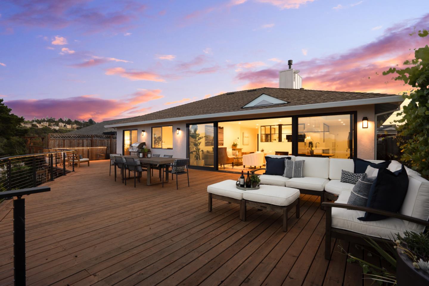 1914 Bishop Road Belmont, CA 94002 - Photo 63 of 79 a view of a patio with dining table and chairs with wooden floor and fence