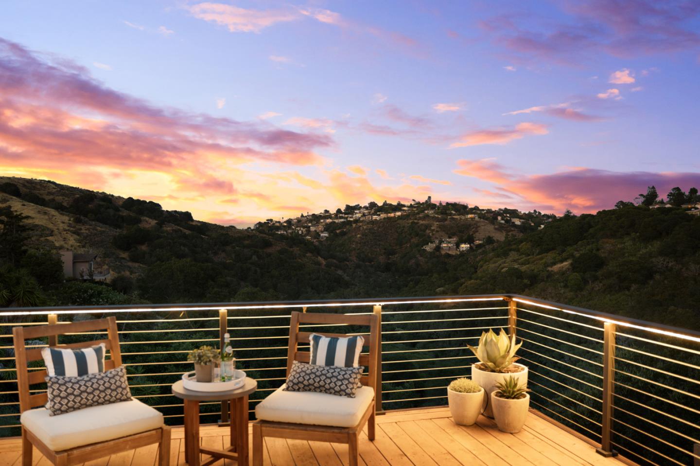 1914 Bishop Road Belmont, CA 94002 - Photo 68 of 79 a view of a city from a balcony with wooden floor and a couple of chairs