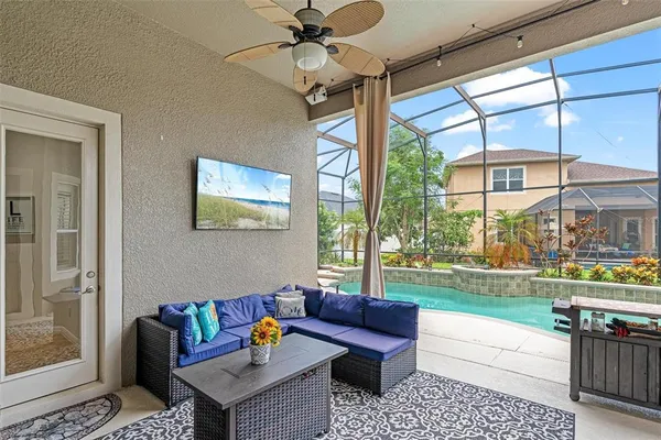 a living room with furniture and a yard